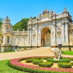 Ceremonial gate and landscaped gardens at Dolmabahçe Palace