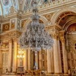 Ornate ceremonial hall with a crystal chandelier