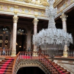 Crystal chandelier above the grand palace staircase